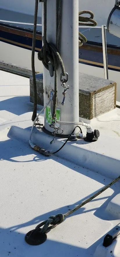 Slide: The Image of 1980 Cape Dory 30 sailboat mast and rigging details on deck. - 30