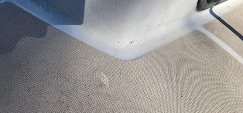 Slide: The Image of 1980 Cape Dory 30 boat deck showing wear and surface cracks. - 37