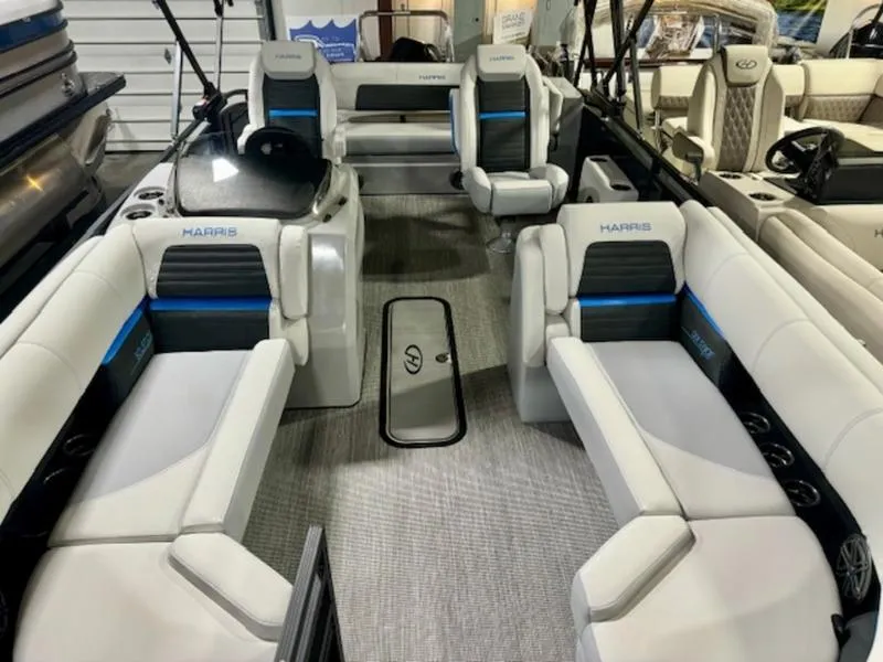 Slide: The Image of 2024 Harris Solstice 230 SLDH pontoon boat interior with luxurious seating. - 3