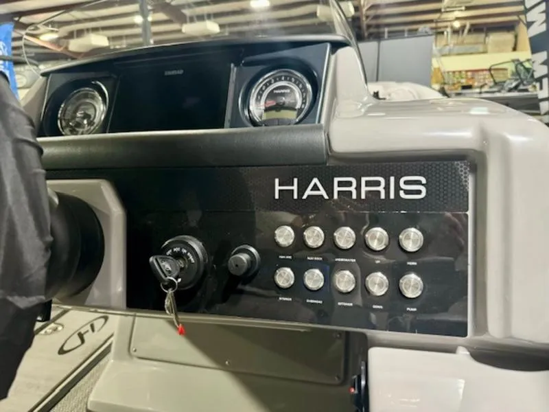Slide: The Image of 2024 Harris Solstice 230 SLDH boat dashboard with controls and gauges. - 7