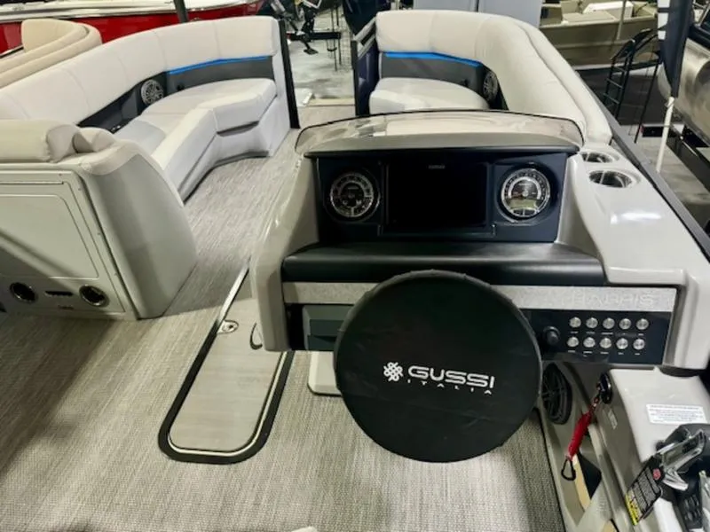 Slide: The Image of 2024 Harris Solstice 230 SLDH boat interior with steering console and seating. - 8