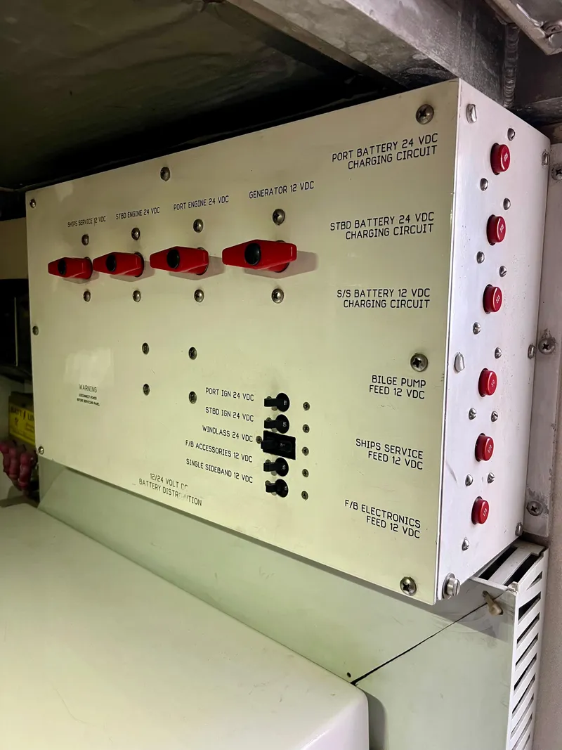 Slide: The Image of Electrical control panel on a 1997 Viking 43 Convertible boat. - 52