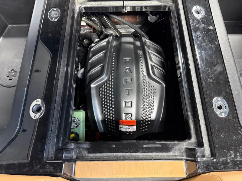 Slide: The Image of Engine compartment of a 2024 Moomba Mojo featuring a Raptor engine. - 29
