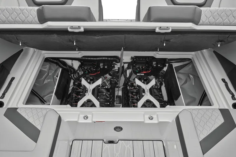 Slide: The Image of 2024 Yamaha Boats 222XD engine compartment with dual engines. - 10