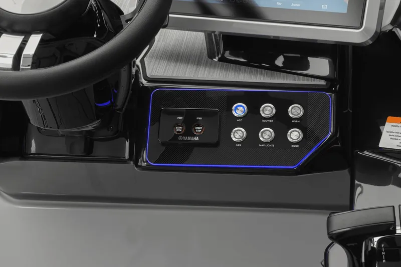 Slide: The Image of Control panel of 2024 Yamaha Boats 222XD with start/stop buttons and accessory switches. - 15