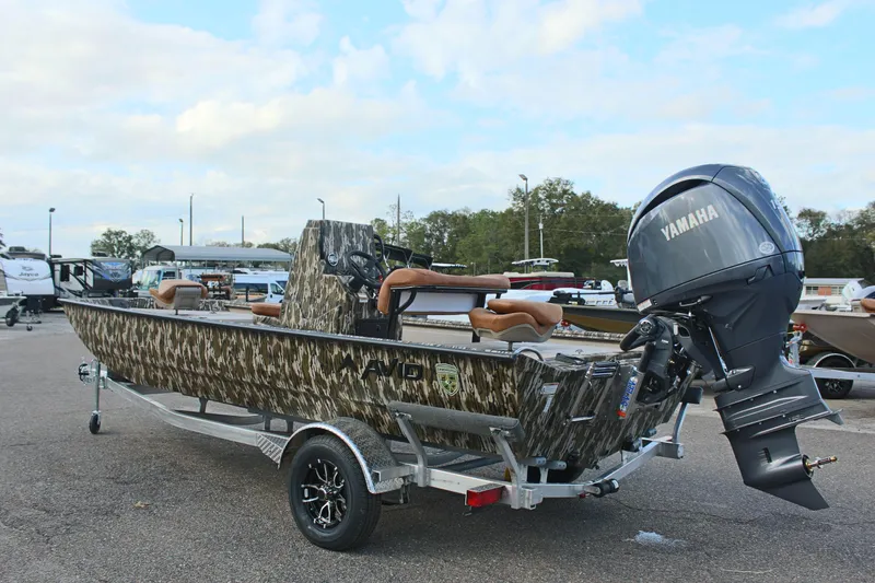 Slide: The Image of 2024 Avid 20 Rogue boat with Yamaha outboard motor on trailer. - 15