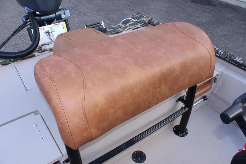 Slide: The Image of 2024 Avid 20 Rogue boat with brown leather seat and black metal frame. - 25