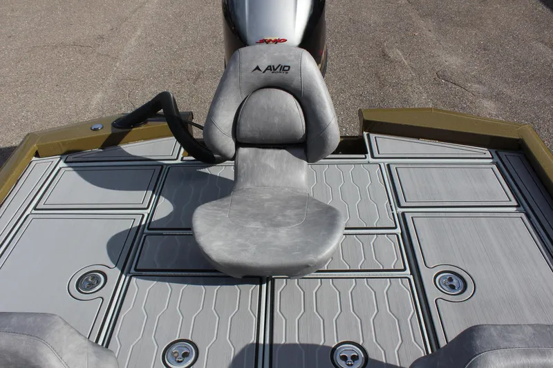 Slide: The Image of 2024 Avid 19 XB boat with gray seating and deck. - 11