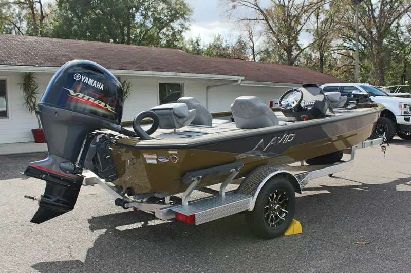 Slide: The Image of 2024 Avid 19 XB fishing boat with Yamaha outboard motor on trailer. - 6