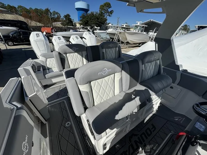 Slide: The Image of 2024 Fountain 38 SCX boat interior with luxurious seating. - 8