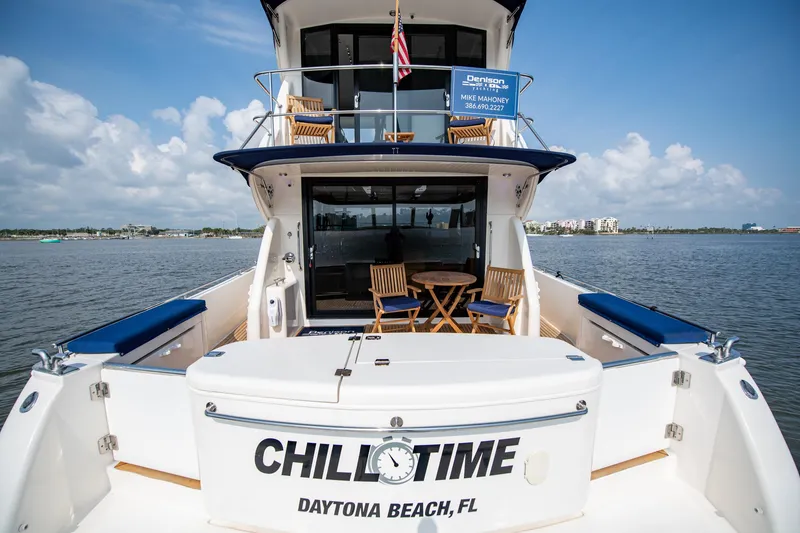 Slide: The Image of 2007 Maritimo Enclosed Fly Bridge yacht on calm water. - 11