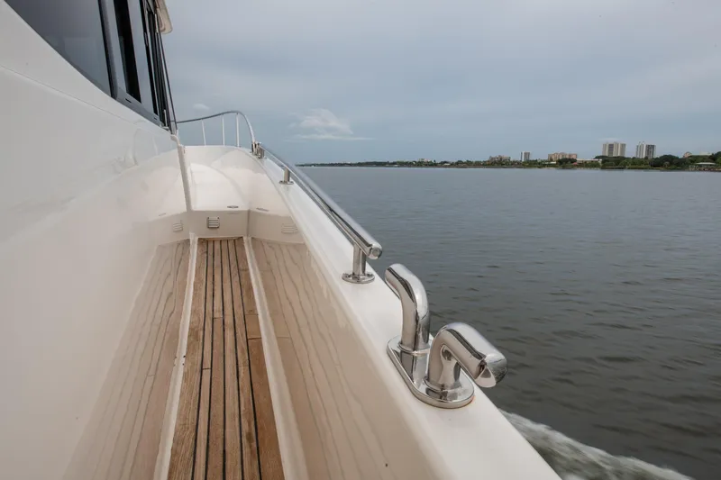 Slide: The Image of 2007 Maritimo Enclosed Fly Bridge yacht on water, side view. - 22