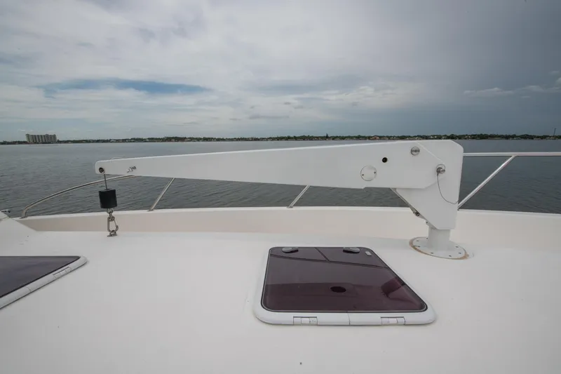 Slide: The Image of 2007 Maritimo Enclosed Fly Bridge yacht cruising on calm waters. - 25