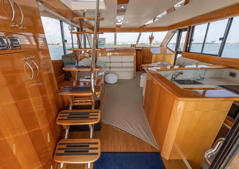 Slide: The Image of 2007 Maritimo Enclosed Fly Bridge yacht docked at night, Daytona Beach, FL. - 34