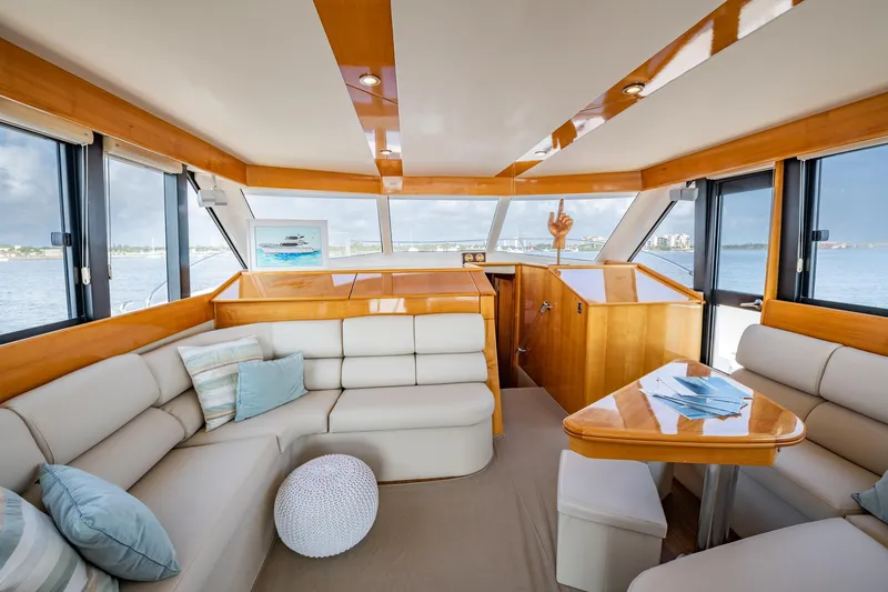 Slide: The Image of Luxurious interior of a 2007 Maritimo Enclosed Fly Bridge yacht with panoramic windows. - 37