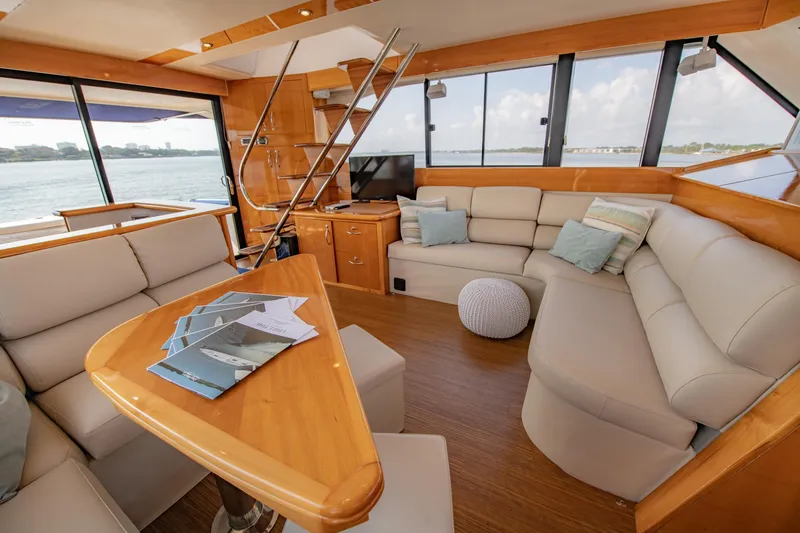 Slide: The Image of Luxurious interior of 2007 Maritimo Enclosed Fly Bridge yacht with panoramic windows. - 38