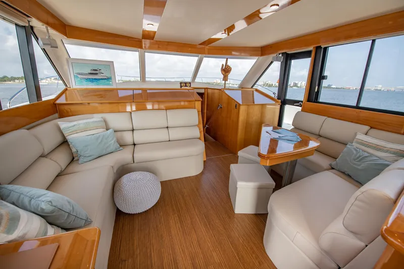 Slide: The Image of Interior of 2007 Maritimo Enclosed Fly Bridge yacht with luxurious seating and panoramic windows. - 40