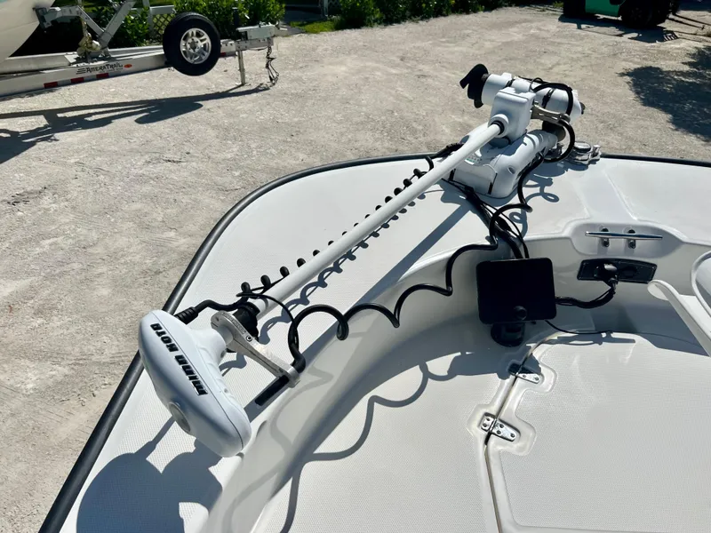 Slide: The Image of 2013 Boston Whaler MONTAUK boat with trolling motor and electronics on deck. - 11