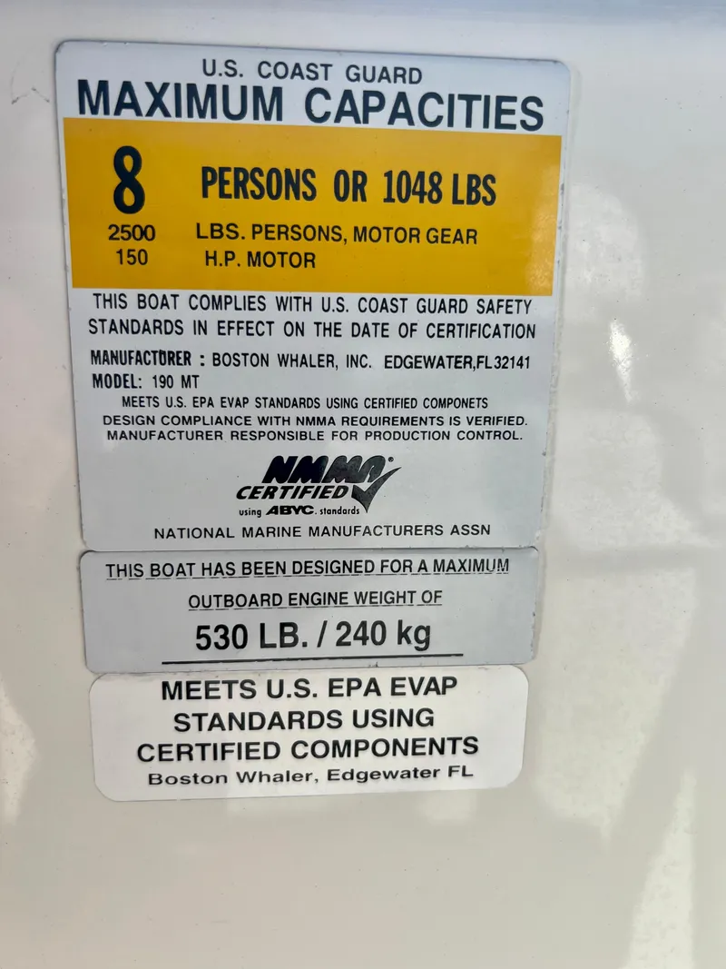 Slide: The Image of 2013 Boston Whaler MONTAUK capacity label, 8 persons or 1048 lbs, EPA standards compliant. - 20