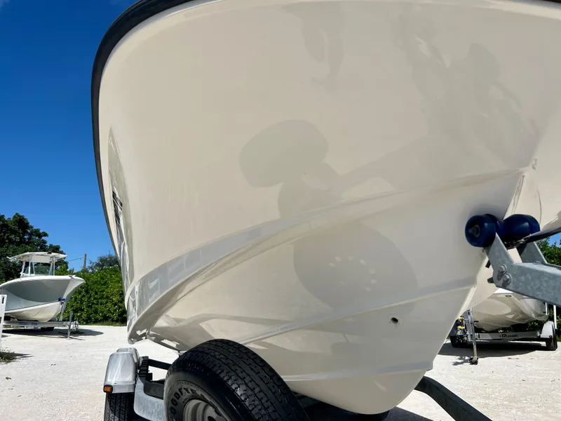 Slide: The Image of 2013 Boston Whaler MONTAUK boat on a trailer, close-up of the hull. - 8