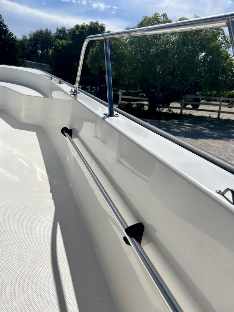 Slide: The Image of 2013 Boston Whaler MONTAUK boat interior with stainless steel railing. - 9