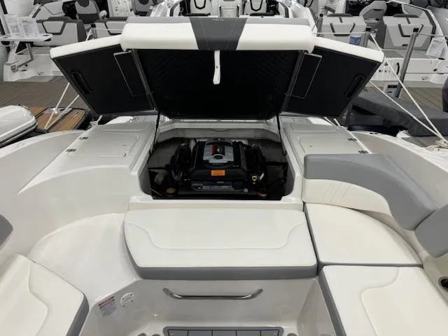 Slide: The Image of 2024 Chaparral 23 SSi boat engine compartment with open hatch. - 20