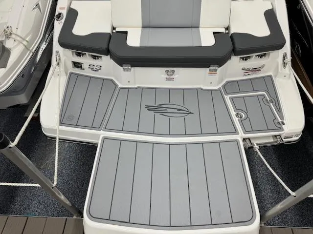 Slide: The Image of 2024 Chaparral 23 SSi boat rear seating and swim platform. - 24