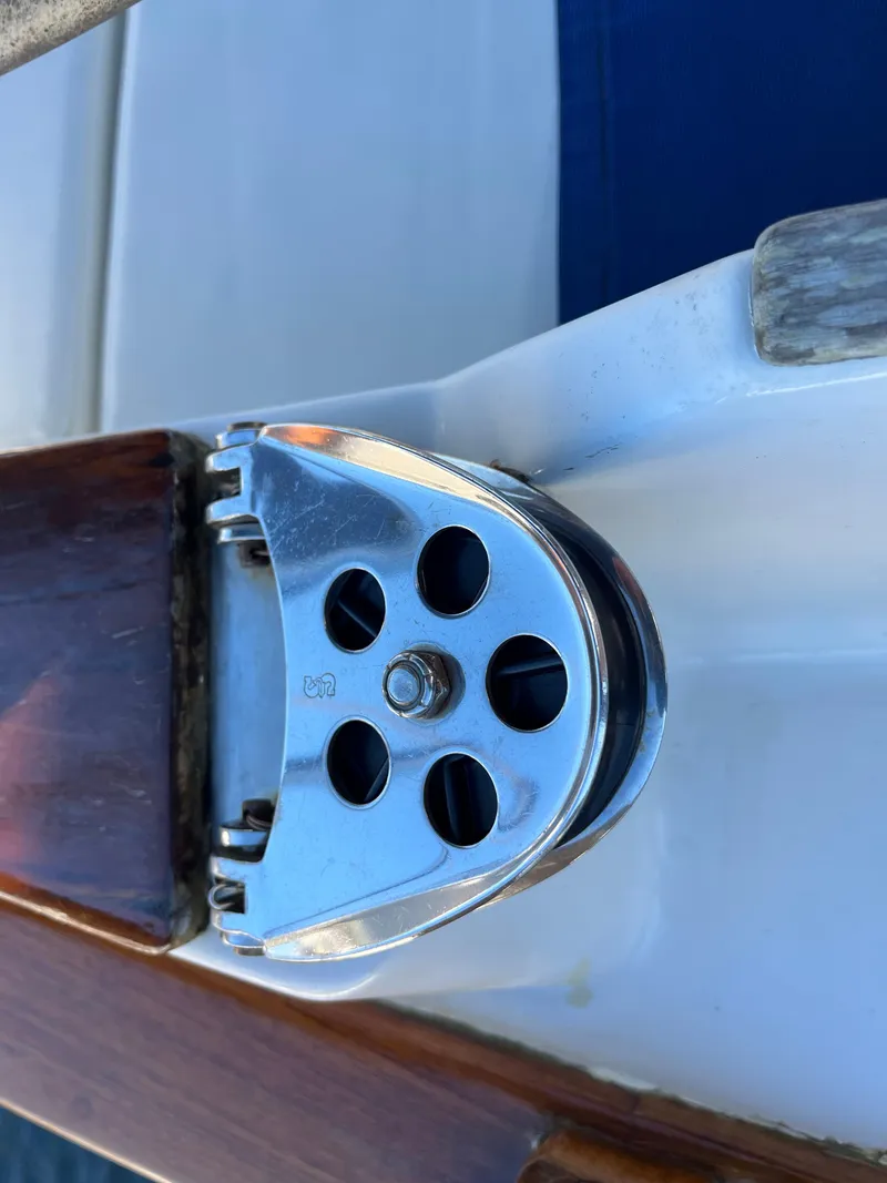 Slide: The Image of Close-up of a pulley block on a 1990 Gozzard 36 sailboat. - 19