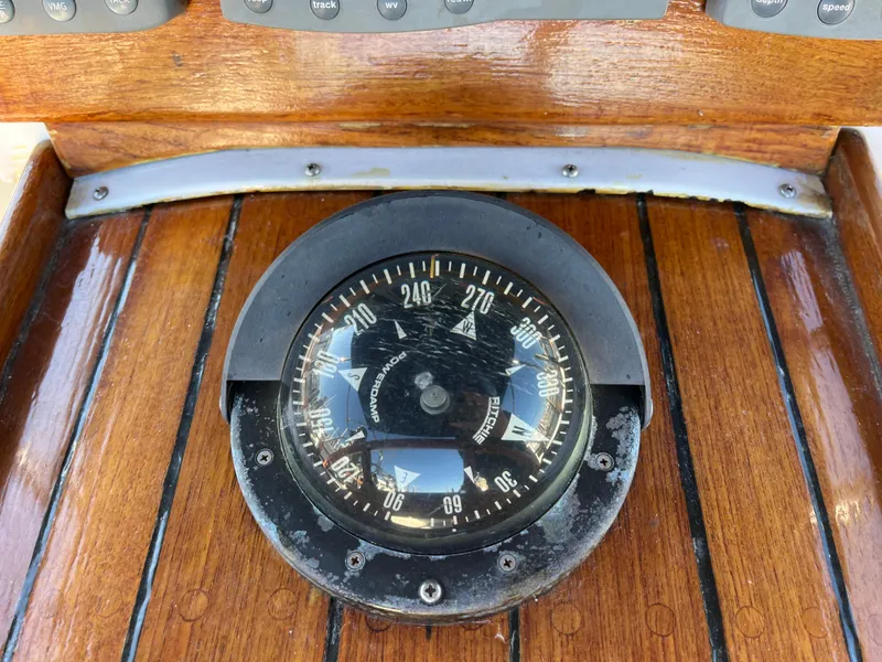 Slide: The Image of Vintage 1990 Gozzard 36 boat compass on polished wooden panel. - 29