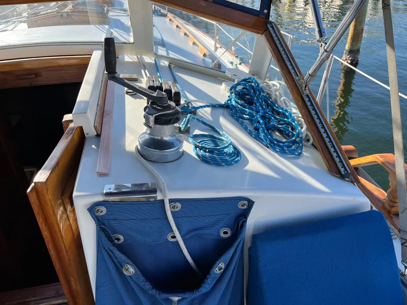Slide: The Image of Cockpit of a 1990 Gozzard 36 sailboat with winch and blue ropes. - 34