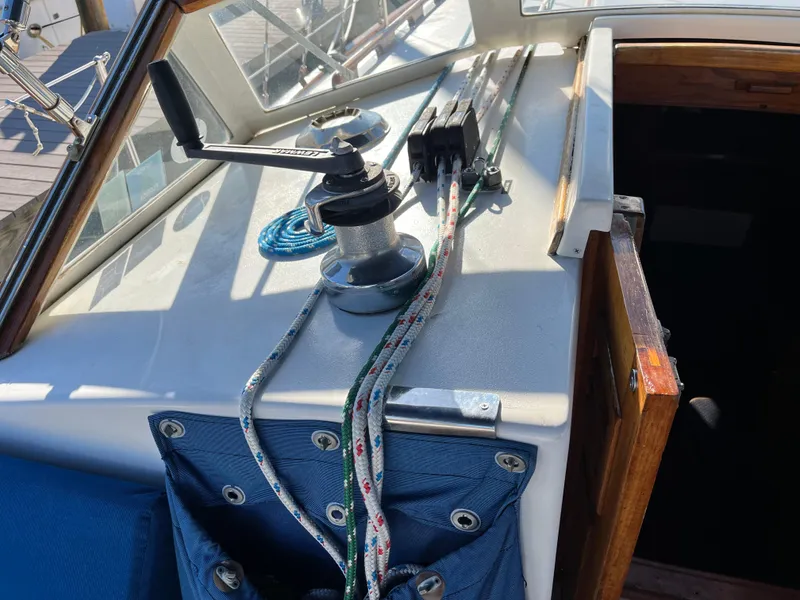 Slide: The Image of Cockpit of 1990 Gozzard 36 sailboat with winch and ropes. - 35
