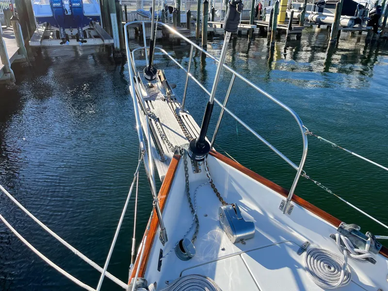 Slide: The Image of Bow of 1990 Gozzard 36 sailboat docked at marina. - 7