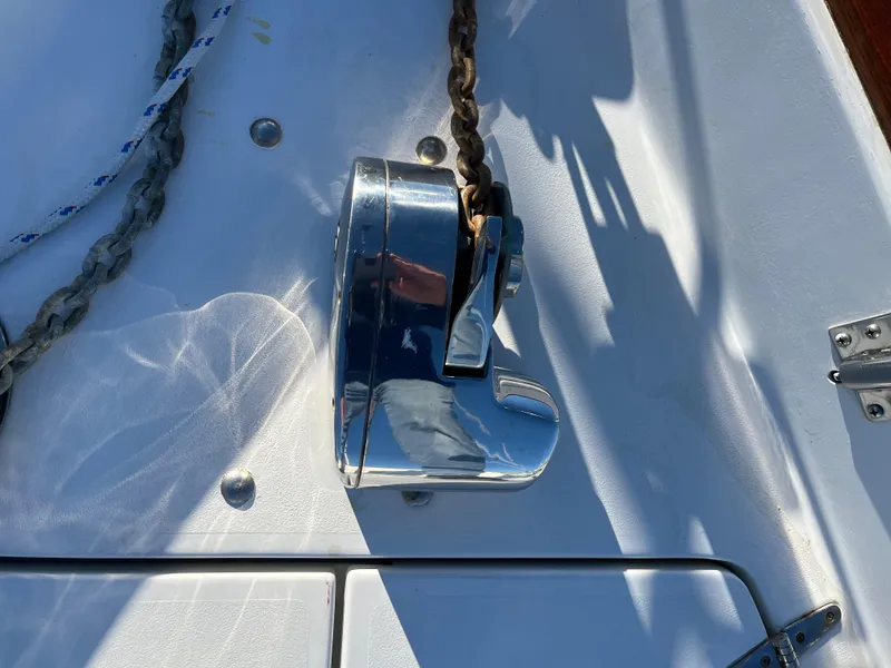 Slide: The Image of Anchor windlass on a 1990 Gozzard 36 sailboat deck. - 8