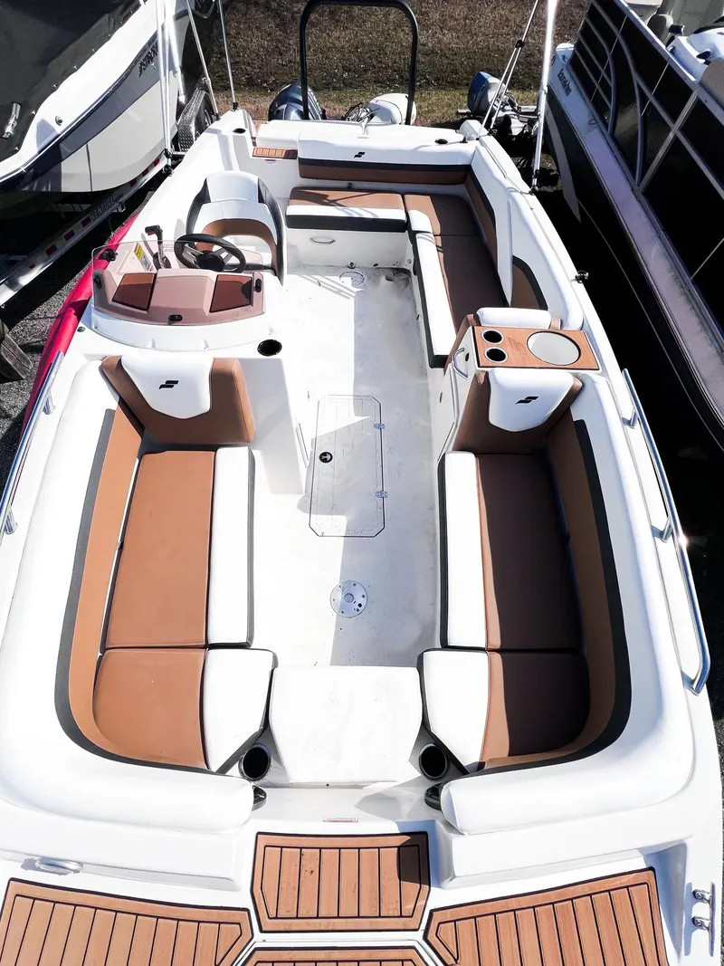 Slide: The Image of 2024 Starcraft SVX 211 OB boat with spacious seating and modern design. - 3