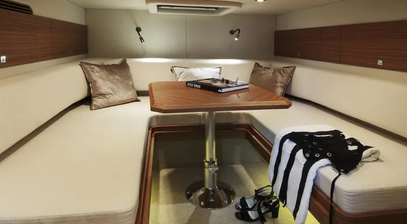 Slide: The Image of Luxurious 2024 Windy SR52 yacht cabin with cozy seating and modern decor. - 13