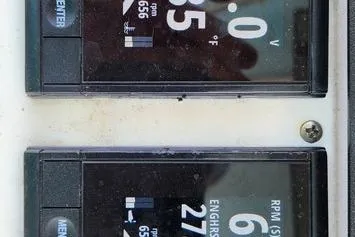 Slide: The Image of Close-up of SeaCraft SC32 Master Angler 2005 engine display showing RPM and temperature. - 31