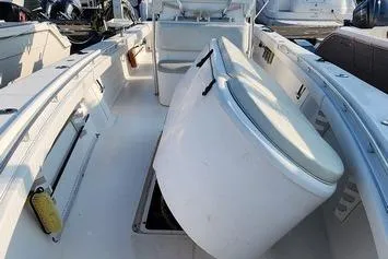 Slide: The Image of 2005 SeaCraft SC32 Master Angler boat interior with open storage compartment. - 37