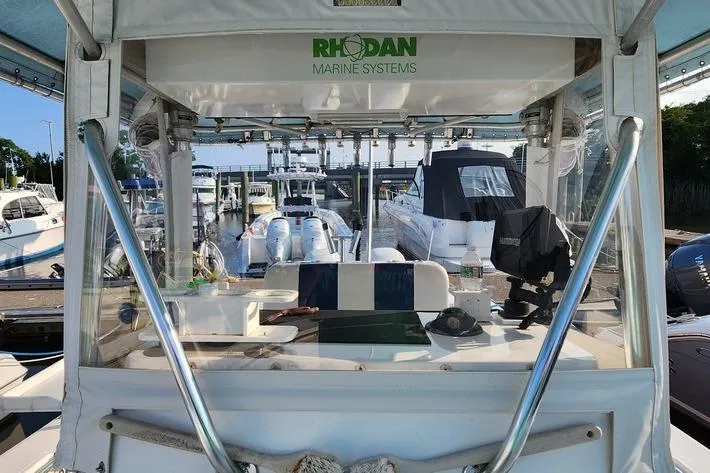 Slide: The Image of 2005 SeaCraft SC32 Master Angler boat with Rhodan Marine Systems at a marina. - 41