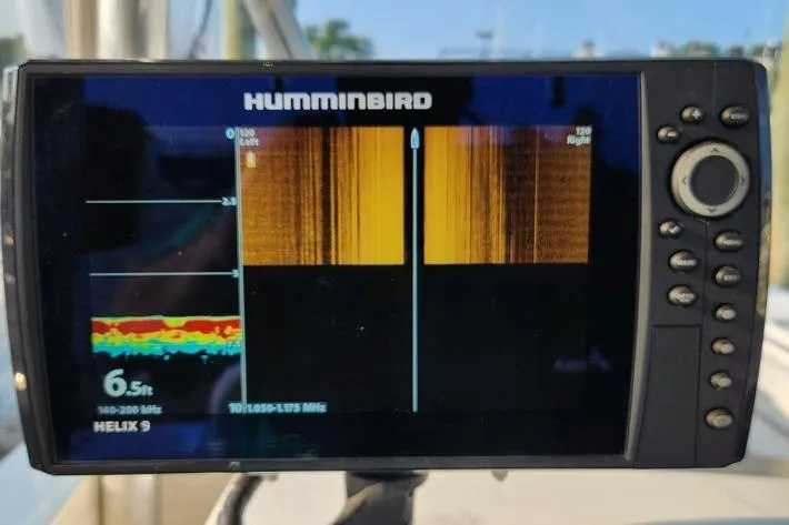 Slide: The Image of Fishfinder display on a 2005 SeaCraft SC32 Master Angler boat, showing sonar readings. - 49