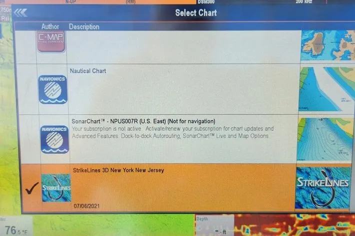 Slide: The Image of Chart selection screen on a SeaCraft SC32 Master Angler, featuring nautical and 3D maps. - 50