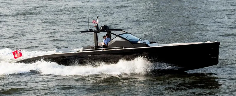 Slide: The Image of 2024 Windy SR52 luxury motor yacht cruising on water. - 1