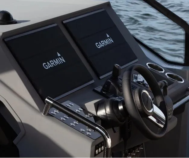 Slide: The Image of Windy SR52 2024 boat dashboard with Garmin navigation screens. - 9