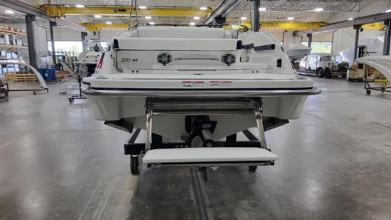 Slide: The Image of 2025 Formula 270 Bowrider boat in a manufacturing facility. - 6