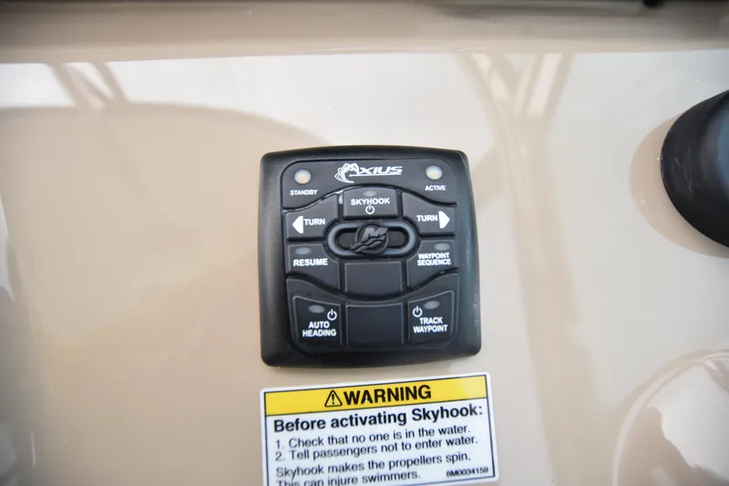 Slide: The Image of Control panel of a 2016 Formula 37 Cruiser boat with Skyhook feature. - 16