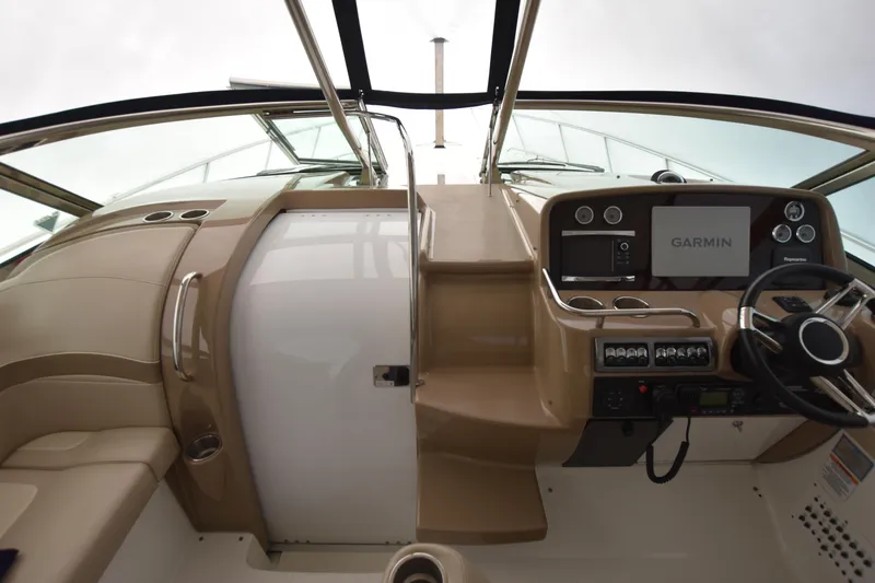 Slide: The Image of 2016 Formula 37 Cruiser helm with Garmin navigation system and modern controls. - 17