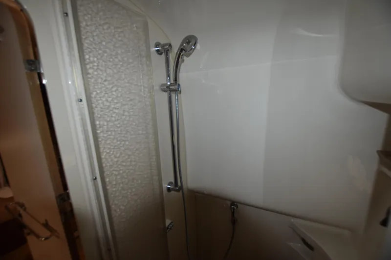 Slide: The Image of 2016 Formula 37 Cruiser bathroom with shower and frosted glass door. - 35