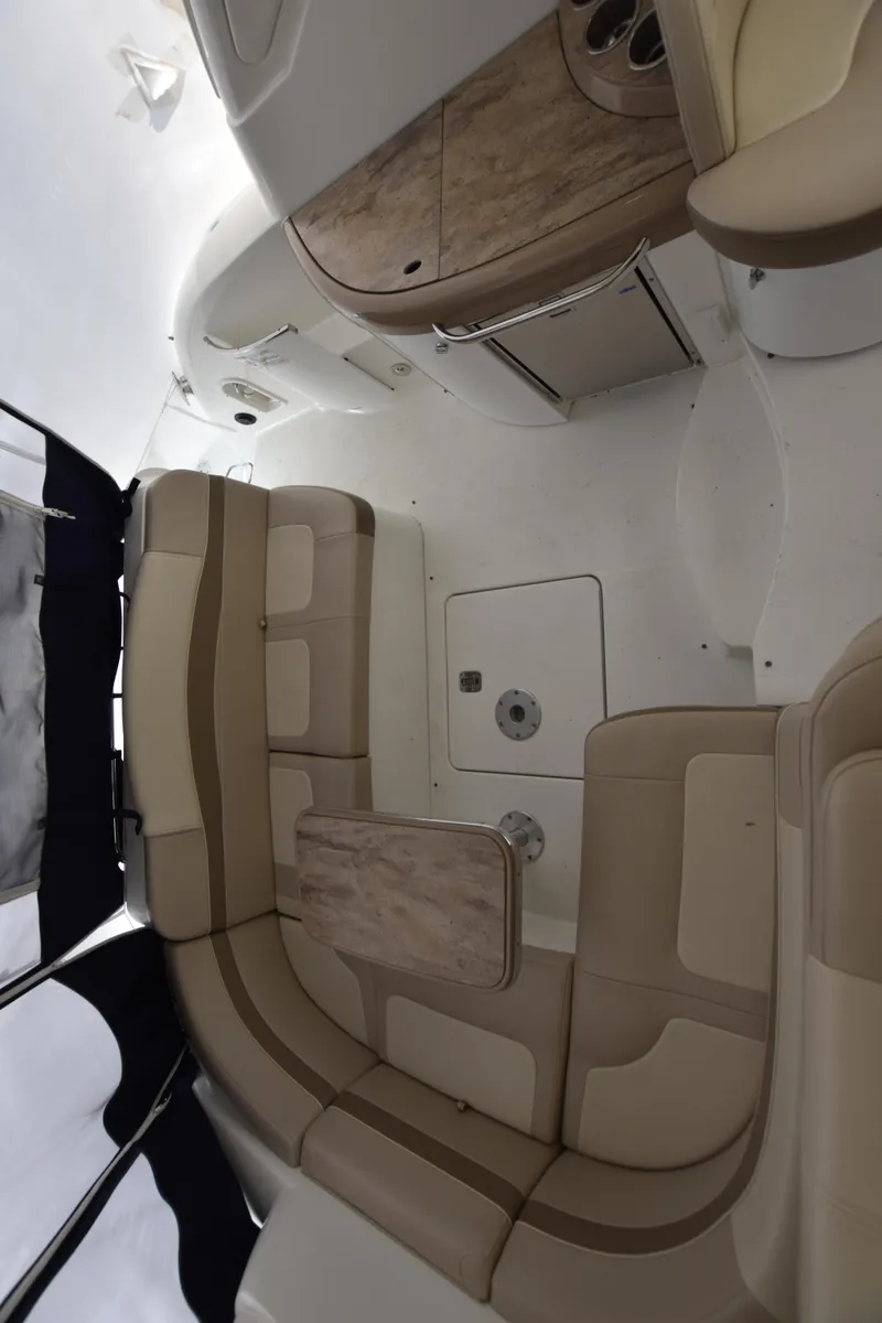 Slide: The Image of Interior of a 2016 Formula 37 Cruiser with beige seating and wooden table. - 41