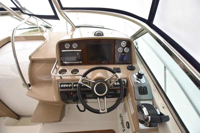 Slide: The Image of Helm of 2016 Formula 37 Cruiser with modern controls and navigation equipment. - 42