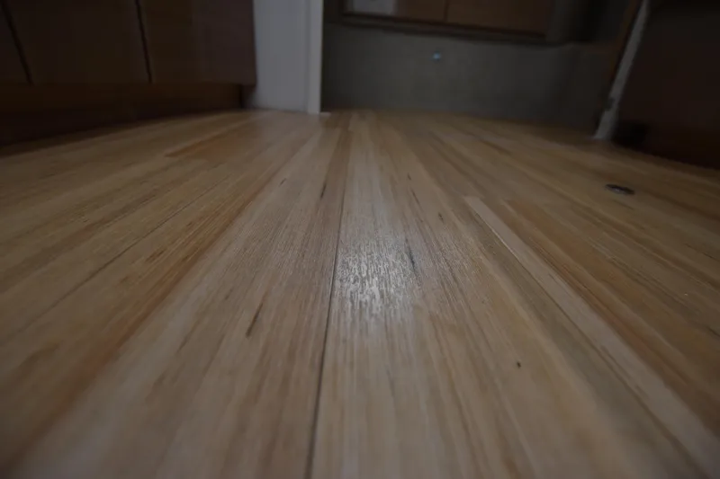 Slide: The Image of Polished wooden floor of a 2016 Formula 37 Cruiser yacht interior. - 48