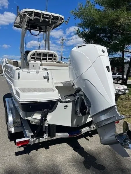 Slide: The Image of 2024 Finseeker 230 boat with powerful outboard motor on a trailer. - 4